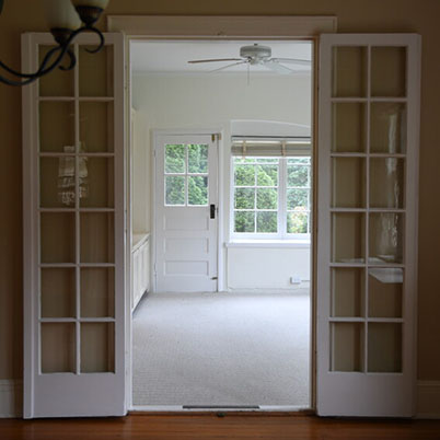Hilton Carter kitchen to living room view - before shot