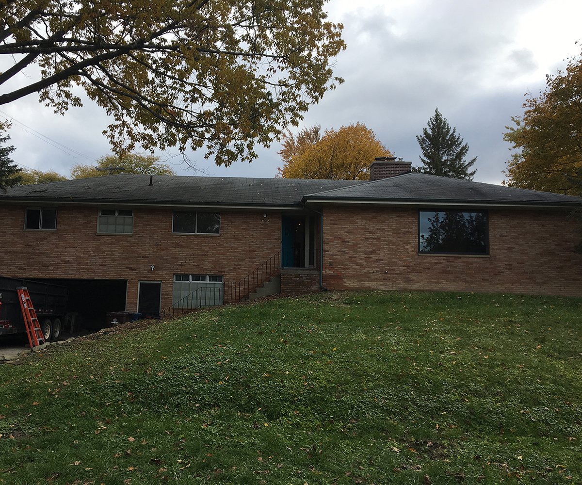 A 1950s ranch home after window replacement and remodeling on the left and before on the right.